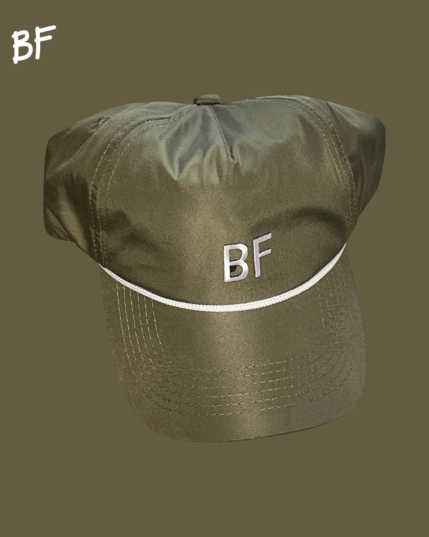 Byrd Finds “Evergreen Cap” in Olive/White