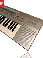 Load image into Gallery viewer, 1980's Casio Casiotone CT-310 Polyphonic Analog Synth
