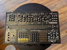 Load image into Gallery viewer, MakeNoise Black and Gold Shared System Plus
